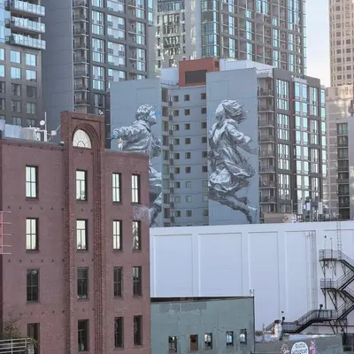 Giant Running Figures Mural