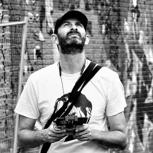 Photographer Documenting Street Art