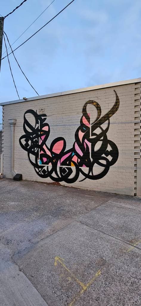 "Walls work both ways" by El Seed in Atlanta