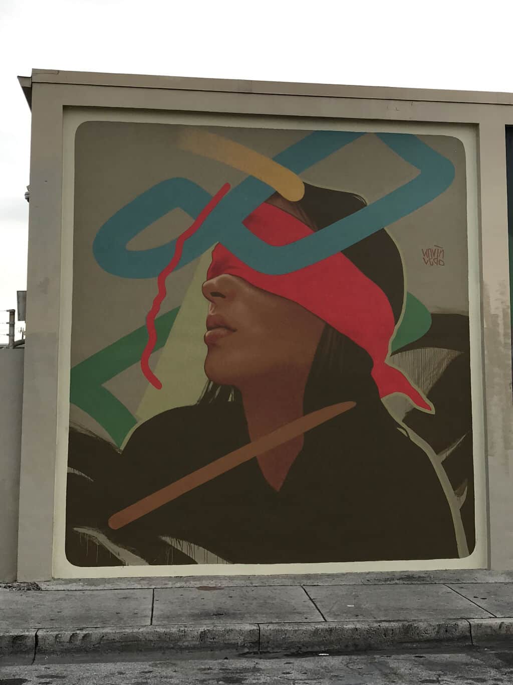 "Figure with Red Headwrap and Tools" by Kevin Ledo in Miami
