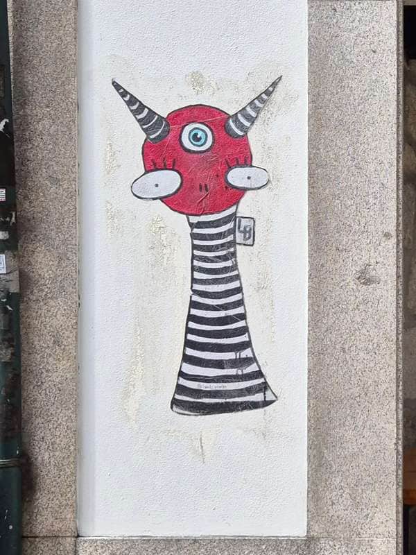 "Striped Devil Head Character" by Lambiscada in Porto