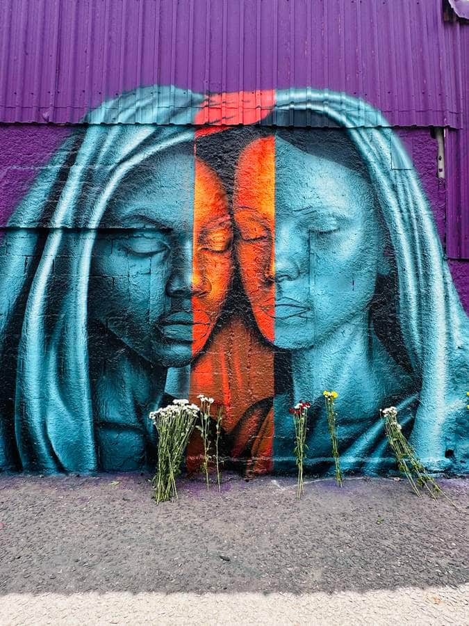 "Divided Faces with Floral Tribute" by Clara Leff in Sao Paulo