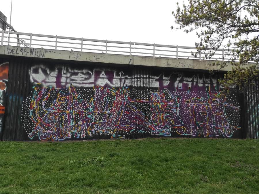 "Colorful Abstract Graffiti Under Bridge" in Prague