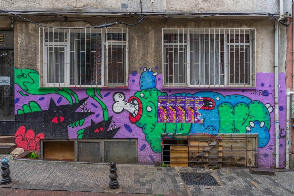 "Intertwined Creatures on Purple Wall" in Istanbul