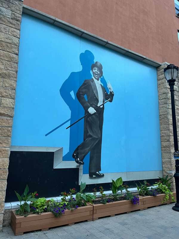 "Silhouetted Figure in Business Attire" by Brandon Adams in New York