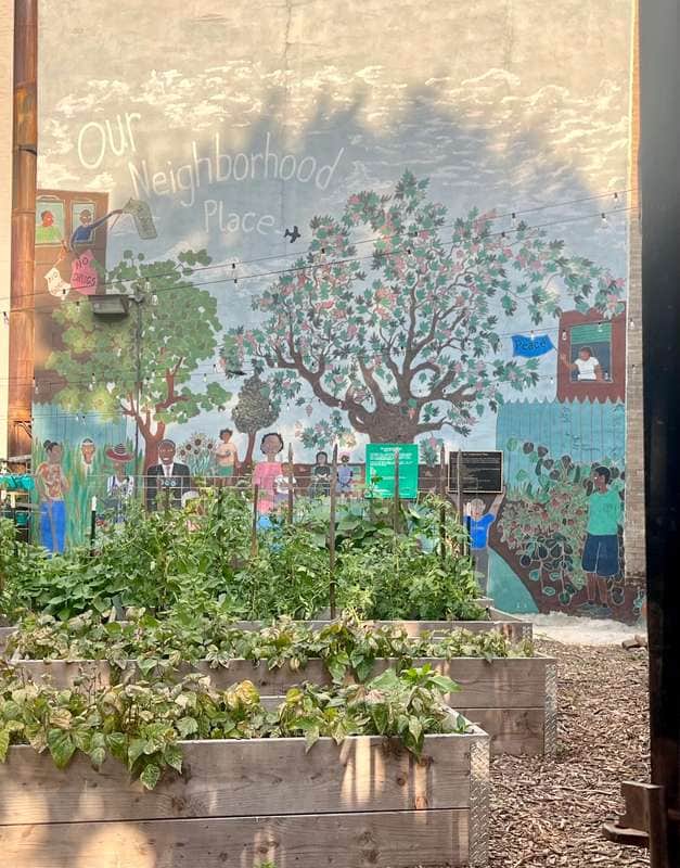 "Our Neighborhood Place Community Mural" by Sankofa Fine Arts in New York