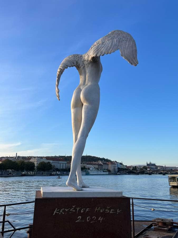 "Winged Female Figure in Flight" by Kryštof Hošek in Prague
