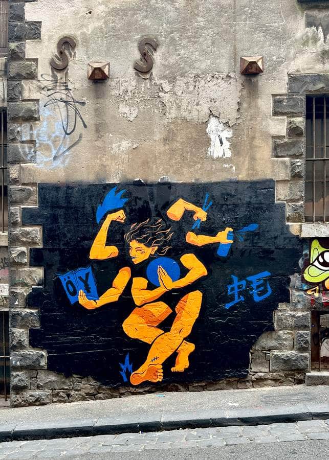 "Dynamic Yellow Figure in Motion" by Oyboogs in Melbourne