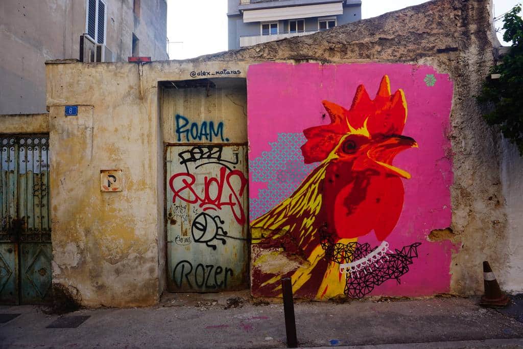 "Vibrant Red Rooster on Pink" by Alex Kataras in Athens