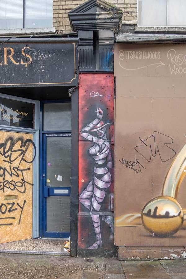 "Wrapped Figure in Red and White" by Otto Schade in London