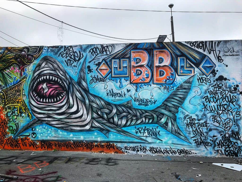 "Aggressive Shark with Blue Text" by Otto Schade in Miami
