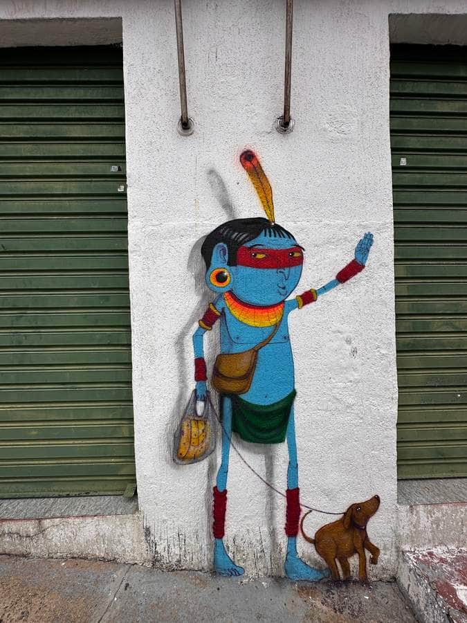 "Indigenous Warrior with Hunting Dog" by Cranio in Sao Paulo