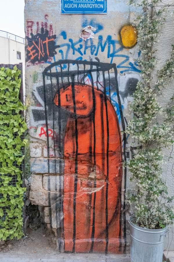 "Caged Bird in Orange" by exit in Athens