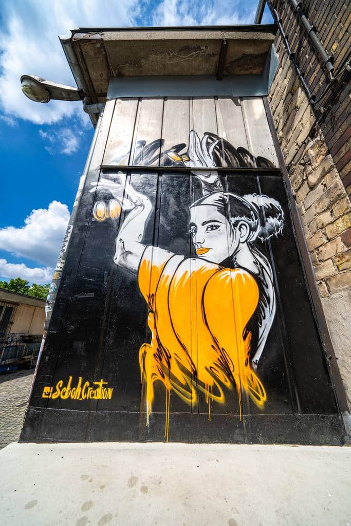 "Woman in Golden Yellow Jacket" by Seboh Creation in Berlin