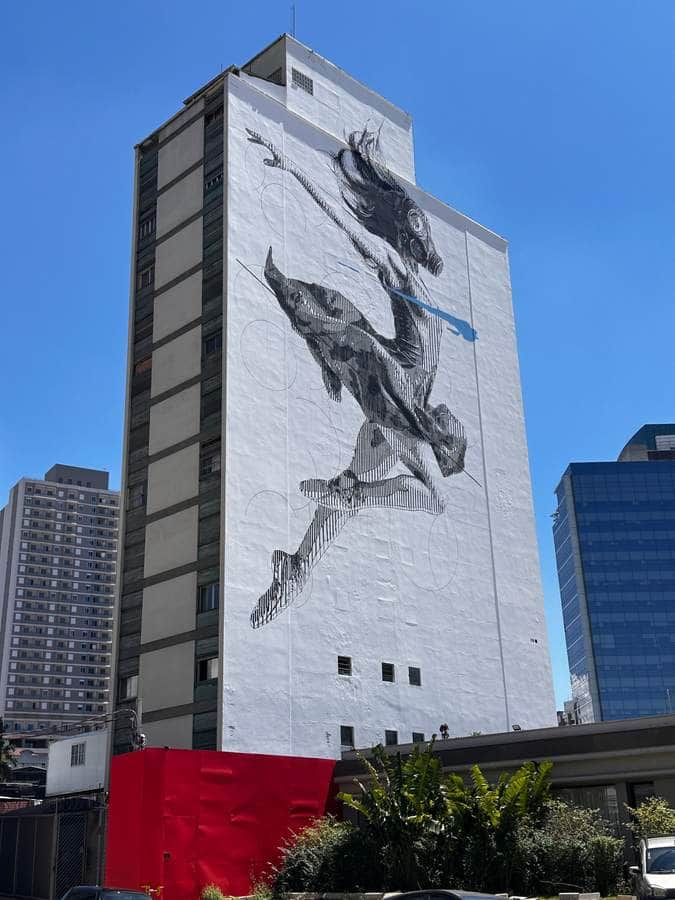 "Floating Woman with Fish" by INO in Sao Paulo