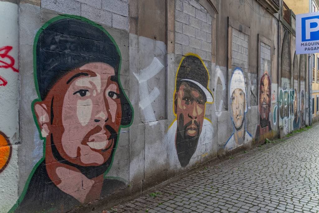 "Portrait Gallery of Faces" by Kilos graffiti in Baixa Do Porto, Porto