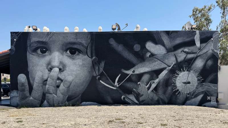 "Child with Silence Gesture" by Royyal Dog in Los Angeles