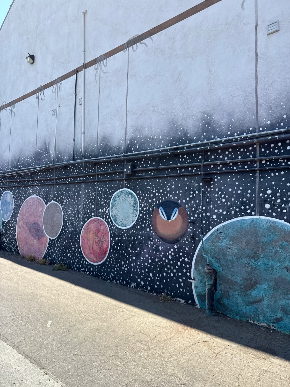 "Cosmic Planets Mural on Wall" in Vista