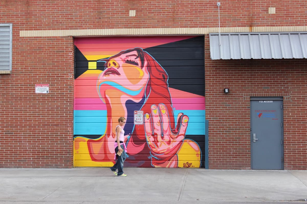 "Vibrant Portrait with Bold Geometric Rays" by Michael Ortiz in Five Points, Denver